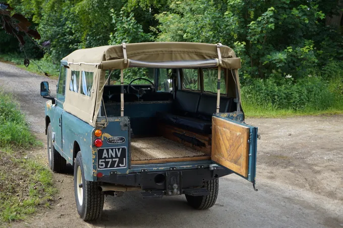 The Land Rover on a country lane