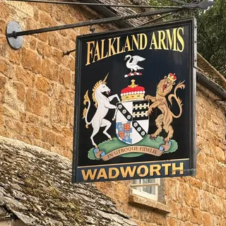 The Falkland Arms pub sign in Great Tew